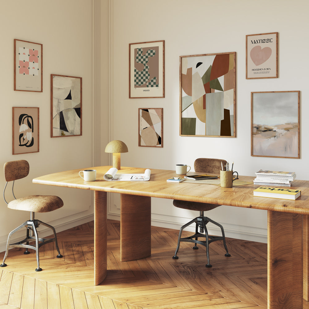gallery wall set of 8 by nook At YOU. Beige gallery wall set placed in an office nook / office decor with a beautiful table and 2 chairs